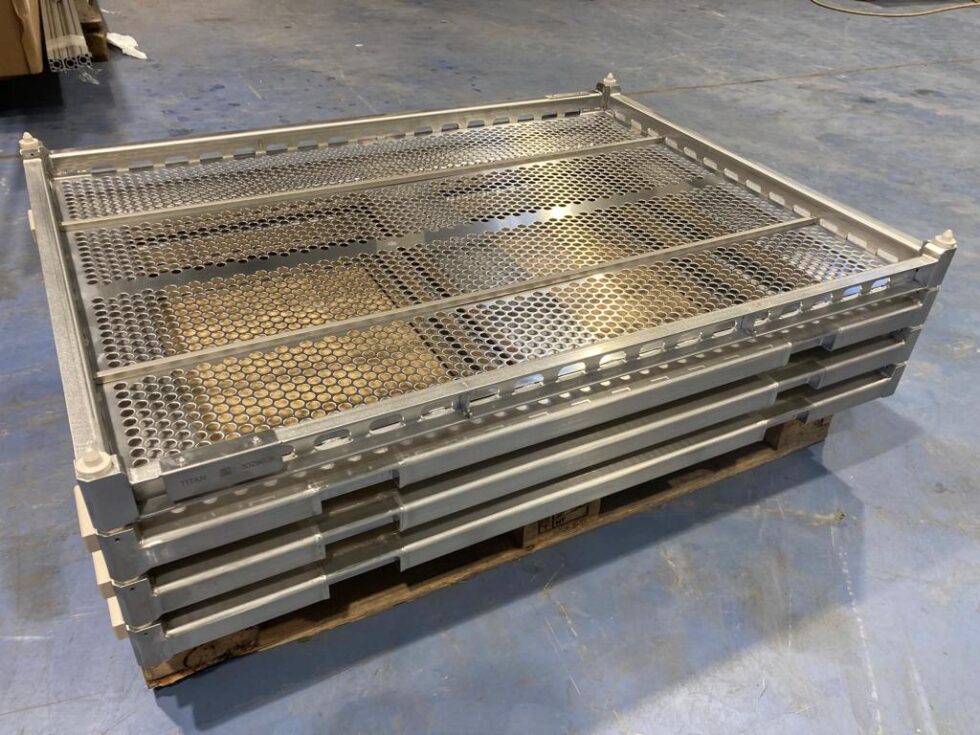 Sterilization trays with locator pins