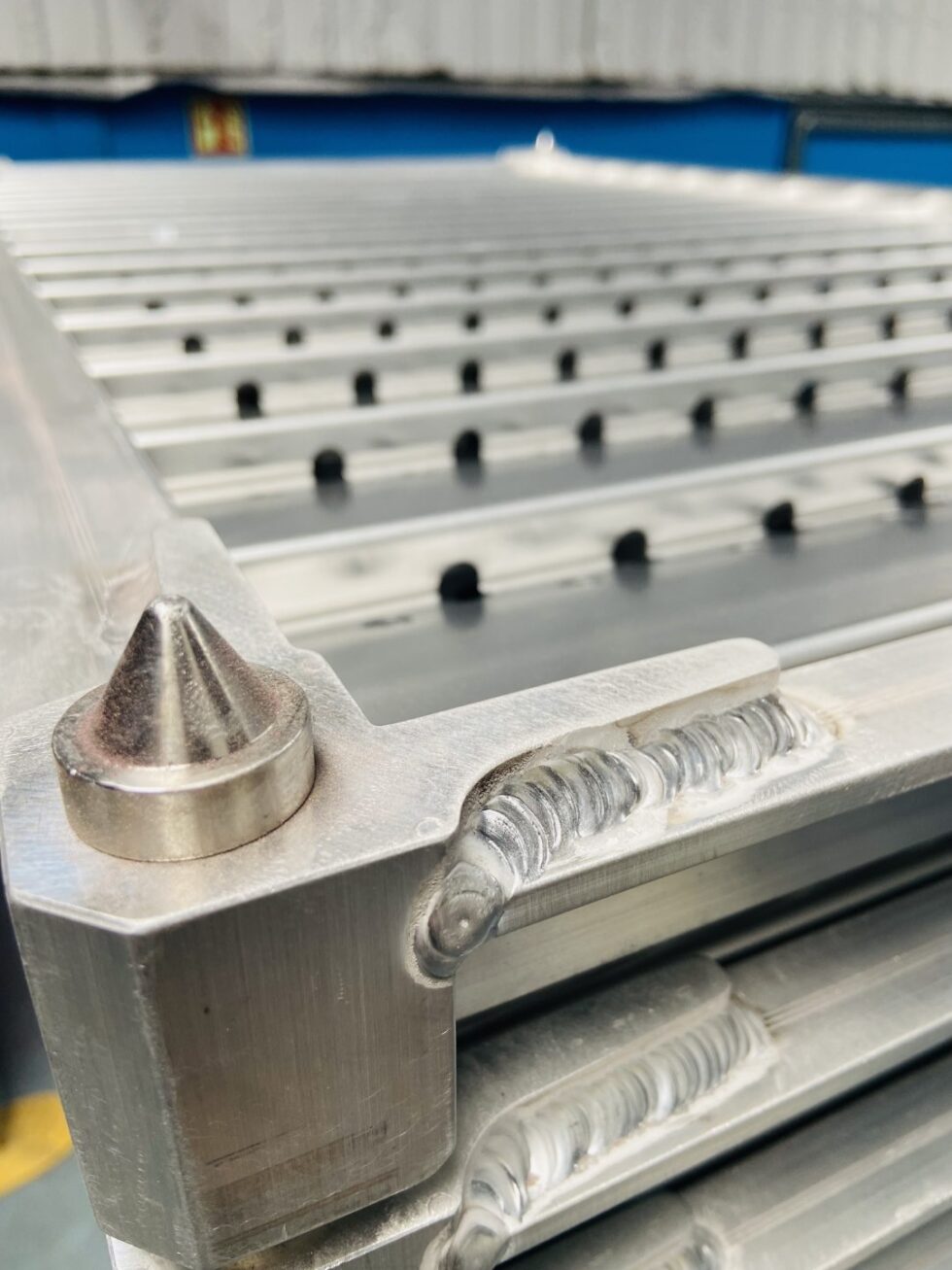 Locator corner pin for spacing the sterilization trays